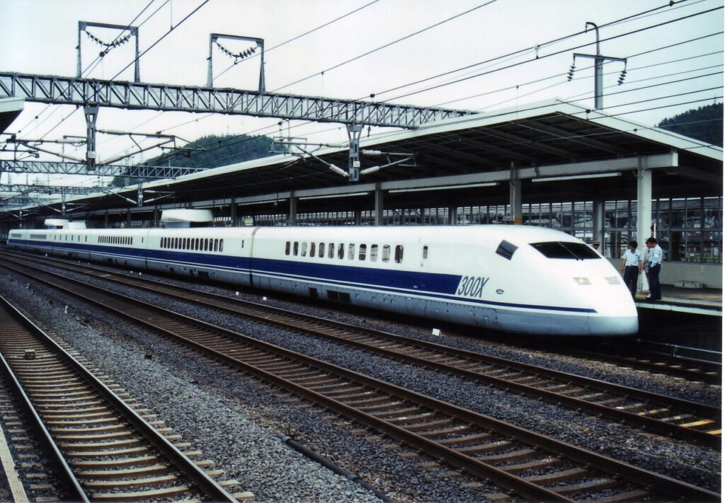 Experimental 955 series (300X) high-speed electric train during a daytime test run at Maibara Station, July 1999