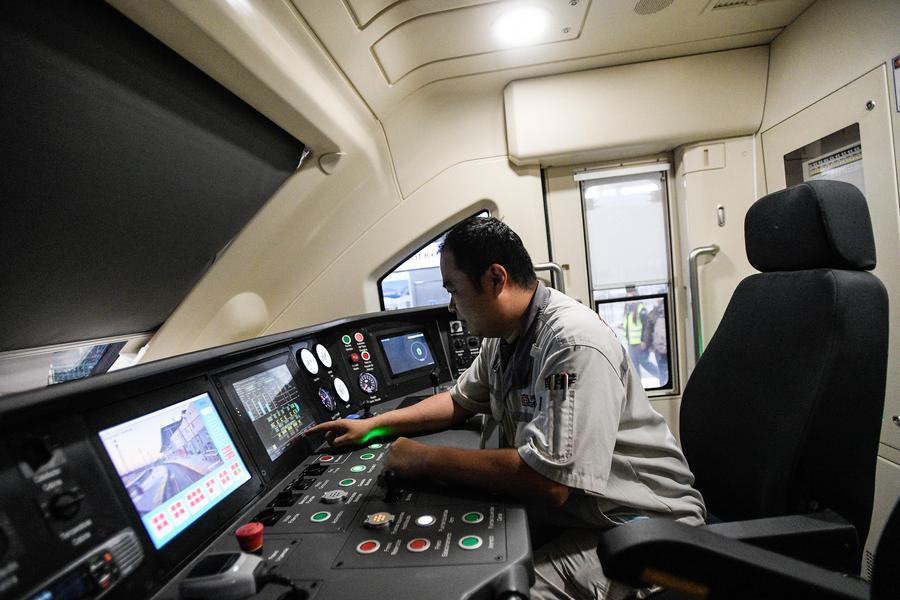 In the driver's cab of the CRRC train for EFE
