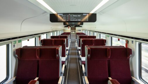 Passenger seats in the second-class coach of the Siemens Mobility Railjet train
