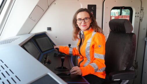 DB Freight Board member Sigrid Nikutta in the driver's cab of the Vectron Dual Mode Light locomotive from Siemens Mobility