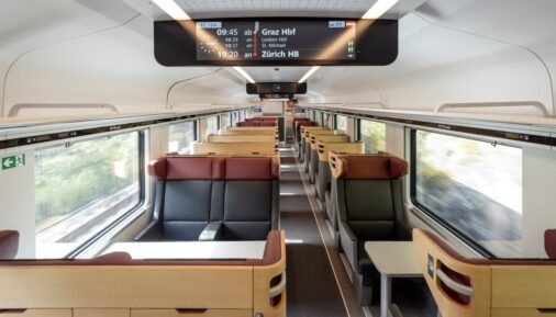 Passenger seats in the first-class coach of the Siemens Mobility Railjet train